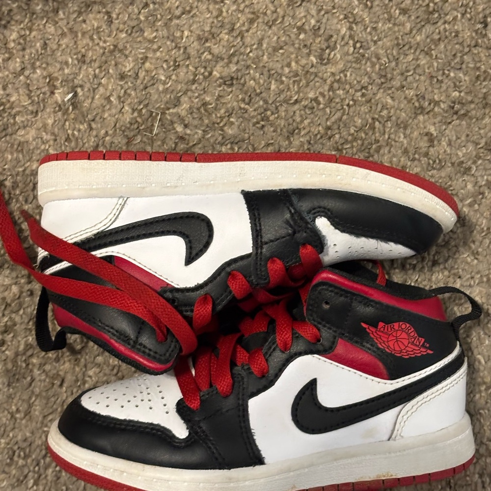 Air Jordan Black and White Sneakers with Red Accents